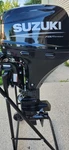 Suzuki Hp Four Stroke Outboard Motor - Model DF15AS5 15" Short Shaft. Fixed Price $2600.00.