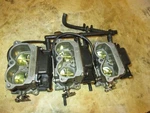 Johnson 150HP Stroke Outboard Carburetor Set (335829). Fixed Price $200.00.