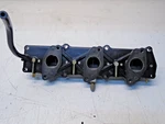 CA2 Evinrude Johnson Outboard 25HP 35HP 3CYL Intake W/ Reeds 438077 438610. Fixed Price $45.00.