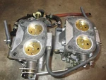 Suzuki DT90 Outboard Carburetor Set (13201-87E90) (13202-87E90). Fixed Price $250.00.