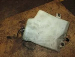 Suzuki DT65 65HP Outboard Oil Tank And Sensor (69110-94701). Fixed Price $70.00.