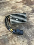 Johnson Evinrude Rectifier Regulator 0584890 Stroke 9.9 10 15 Hp. Fixed Price $65.00.