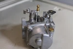 Tohatsu Carburetor Lower Assembly M90ADJJ25 # 3L9032100 M80, Nissan NS80. Fixed Price $218.00.