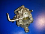 0386183 Carburetor = Johnson Evinrude (73 H). Fixed Price $55.00.