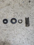Vintage 1954 Evinrude 7514 Fleetwin 7.5HP Outboard Motor Lower Crank Seal. Fixed Price $6.00.