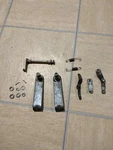 1997 Suzuki 90HP Tilt Lock Lever Assembly. Fixed Price $65.00.
