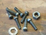 Vintage Johnson Seahorse 10HP QD-14 Outboard Motor Carburetor Mounting Screws. Fixed Price $12.95.