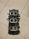 1989 Mercury 150HP Intake Manifold Assembly / Reed Block Housing. Fixed Price $100.00.