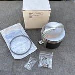 Omc Johnson Evinrude New Piston Kit .040 Over Size 85-235HP 438998 439002 395627. Fixed Price $125.00.