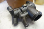 New 0910200 - Thermostat Housing Genuine Omc Johnson Evinrude Oem Nos Nla. Fixed Price $99.95.