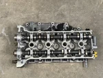 Oem Suzuki Cylinder Head Assembly 11100-90J11 11170-90J12 DF140 Hp. Fixed Price $299.99.