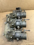 Yamaha Manifold With Oem Tps Throttle Bodies, 69J-13641-00-00, 2005 F200TXR. Fixed Price $180.97.