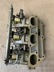 Oem Yamaha Starboard Side Throttle Body Pn# 69J-13750-00-00 (B-22). Fixed Price $125.99.