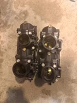 Johnson 115HP 60 Degree Stroke Outboard Carburetor Set (5002140/5002141). Fixed Price $180.00.