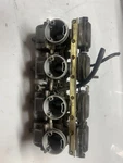 1983 Suzuki GS750E Oem Complete Carburetor Rack Assembly Carbs. Fixed Price $399.99.