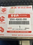 Suzuki 12100-42A32-050. Fixed Price $75.00.