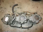 Johnson Evinrude Outboard Carburetor Set (319230). Fixed Price $200.00.