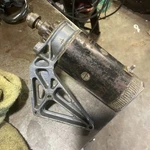 Johnson / Evinrude 35HP Starter And Bracket 305084. Fixed Price $40.00.